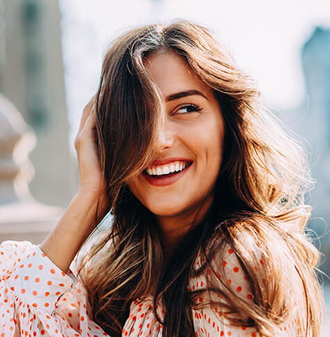 a young woman smiling